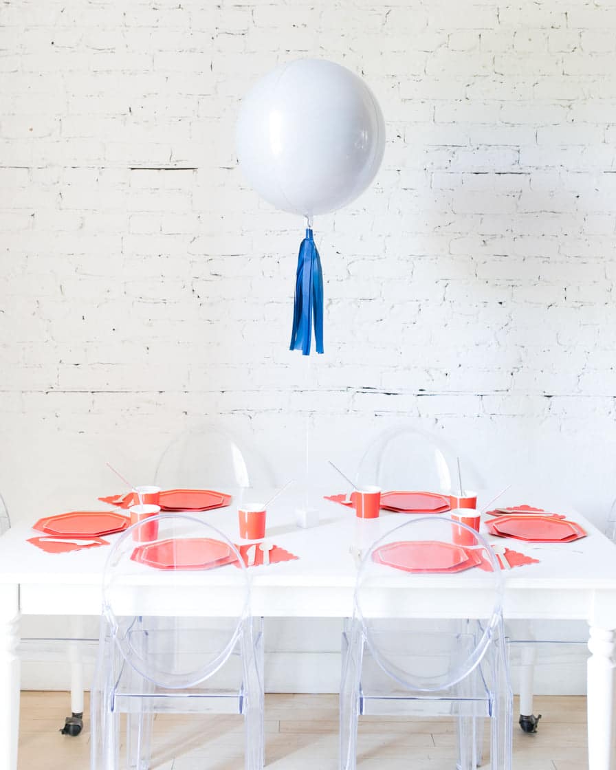 16in White Orb Foil Balloon and Navy Skirt Centerpiece | Rental