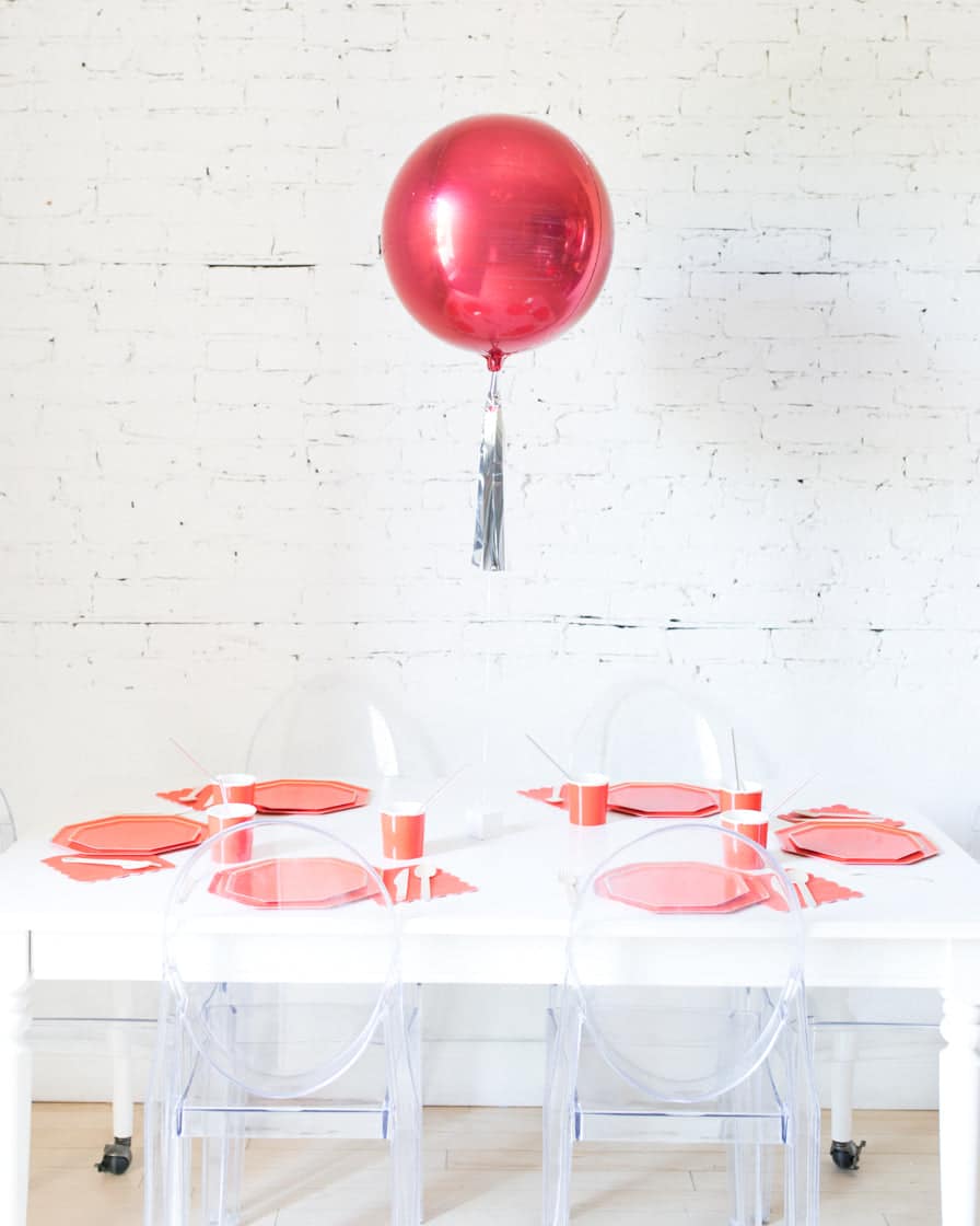 16in Red Orb Foil Balloon and Silver Skirt Centerpiece | Rental