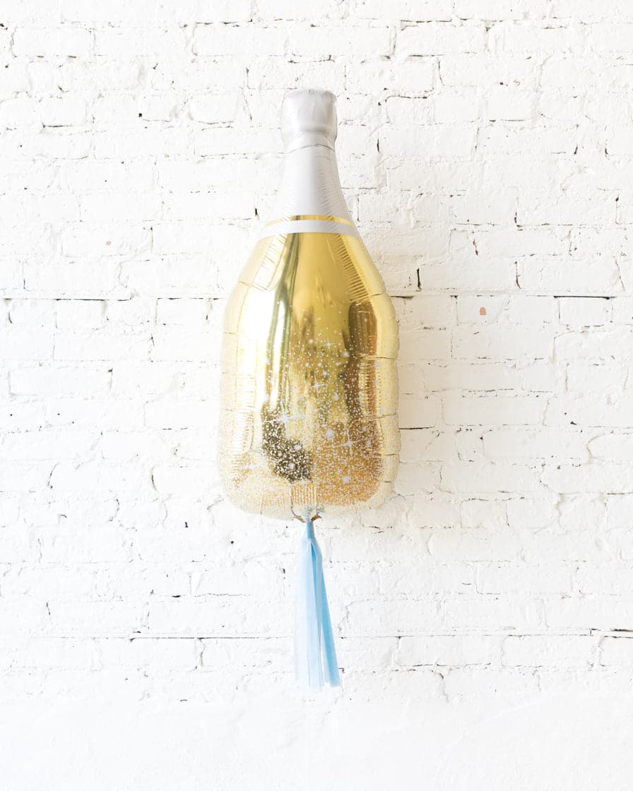 36in Gold Champagne Bottle Foil Balloon and French Blue Skirt | Rental